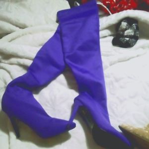 Stilletto knee high boots